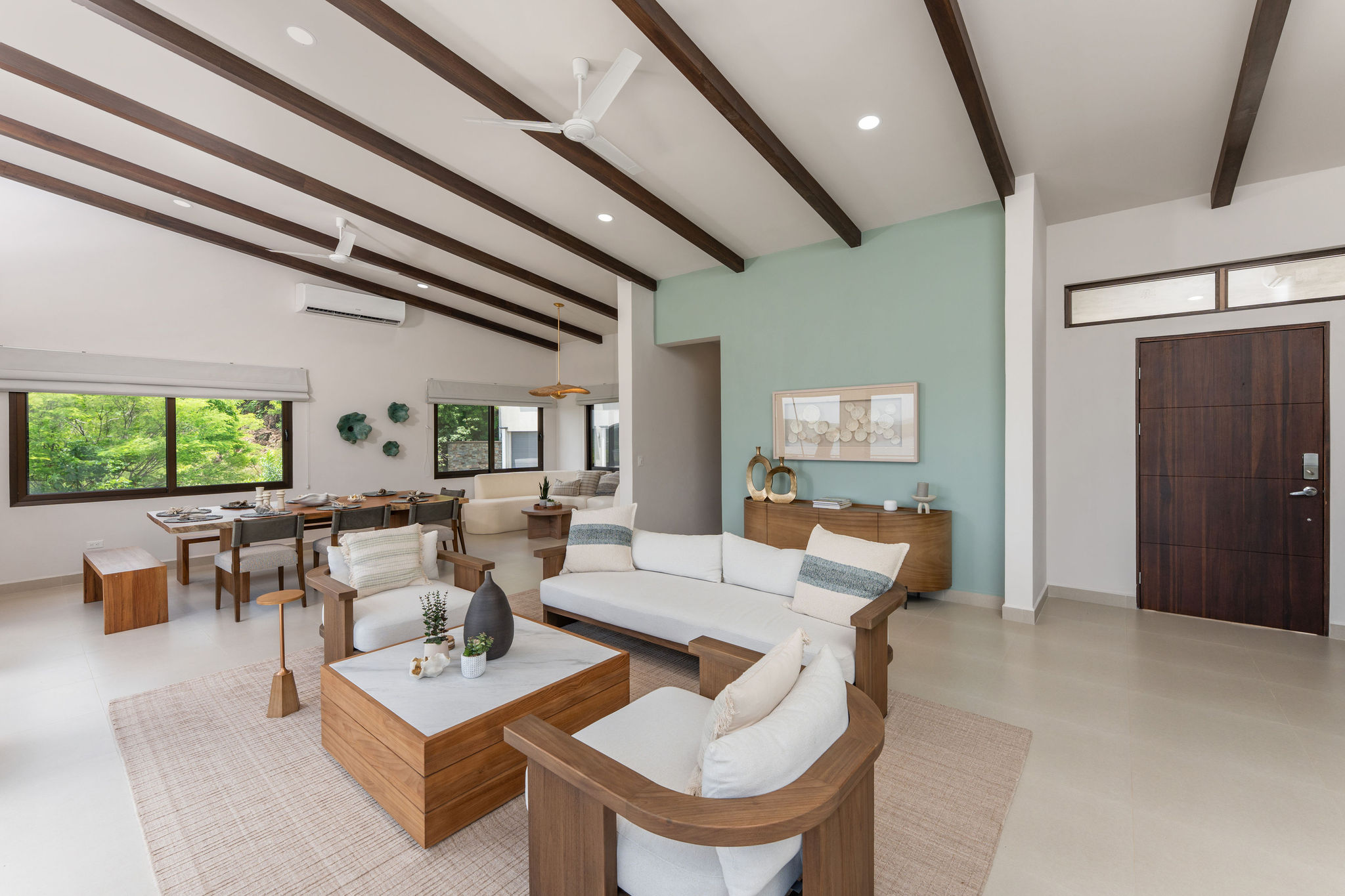 Open living and dining area with a view toward the entry