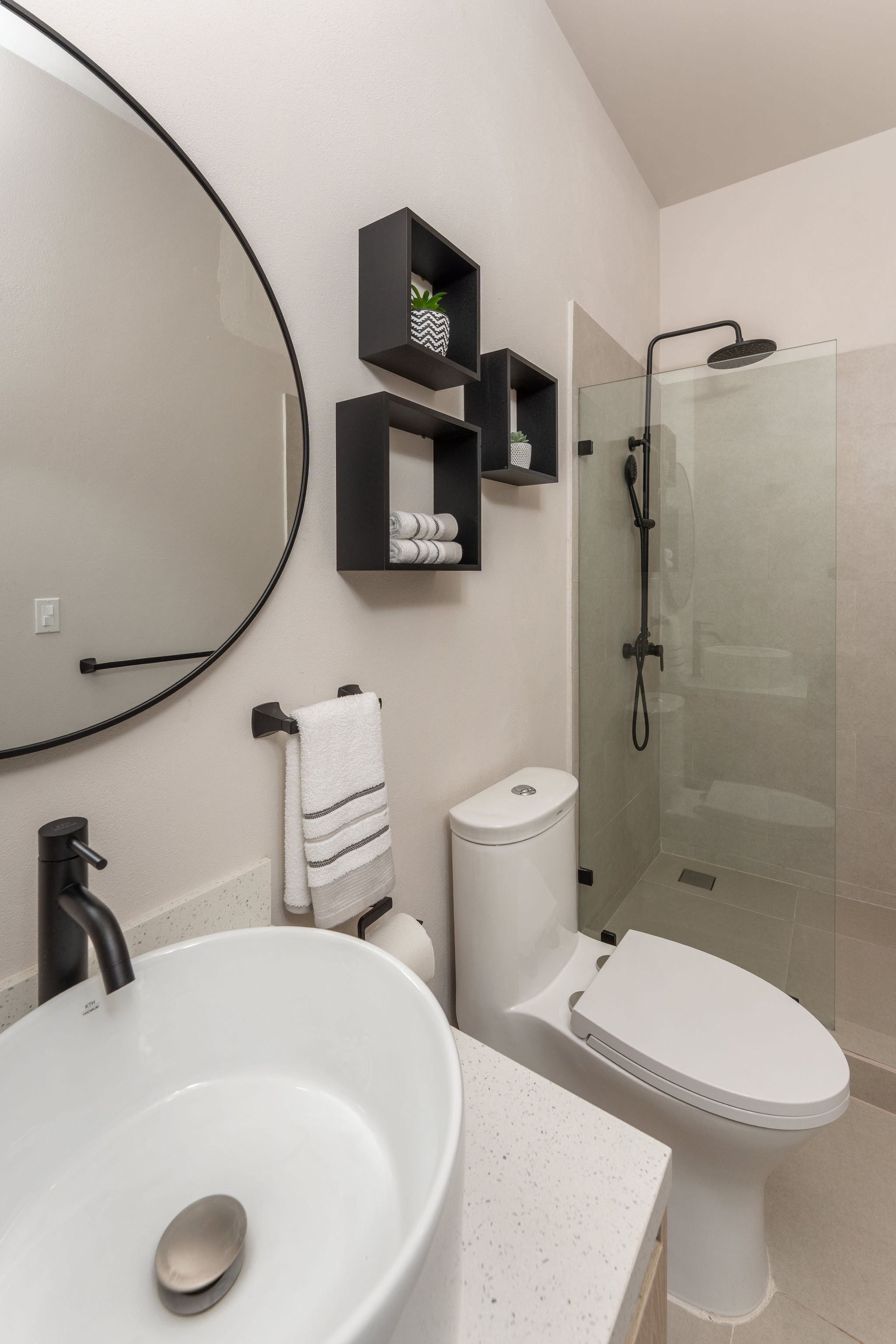 Bathroom with walk-in shower and modern fixtures